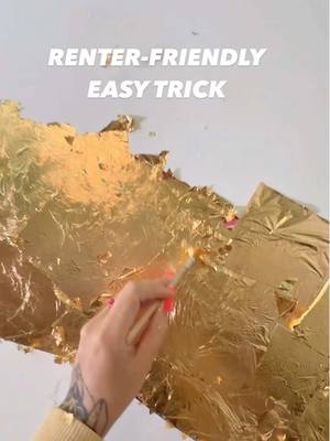 A post by @taybeepboop on TikTok caption: I love a challenge like this. Upcycling scrap material and turning something that isn’t renter-friendly into a renter-friendly addition to my house 🥹 Linked the whole gold leaf kit I used in my linktree as always 