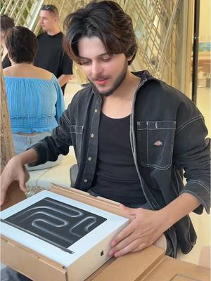 A post by @nadeemmubarakofficial on TikTok caption: Kis ko chiey macbook comments main btao #nadeemmubarakofficial #army804 