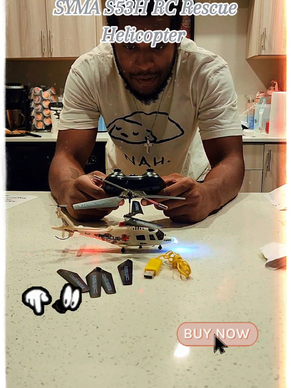 A post by @mrs.monicalsmith on TikTok caption: S53H RC Rescue Helicopter  - Available In White or Red Camouflage  - Bright Navigation Lights  - Altitude Hold  - One Key Takeoff / Landing  - Low Power Alarm - Emergency Stop  #capcut #tiktokshop #tiktoktrending #friendsoftiktok #tiktokfriends #tiktoktoys #rchelicopters #hobby #hobbies #techtok #rctoys @symatoys.us @symatoy #remotecontroltoy #remotecontrolhelicopter #share #Like #Comment #Follow #Repost 