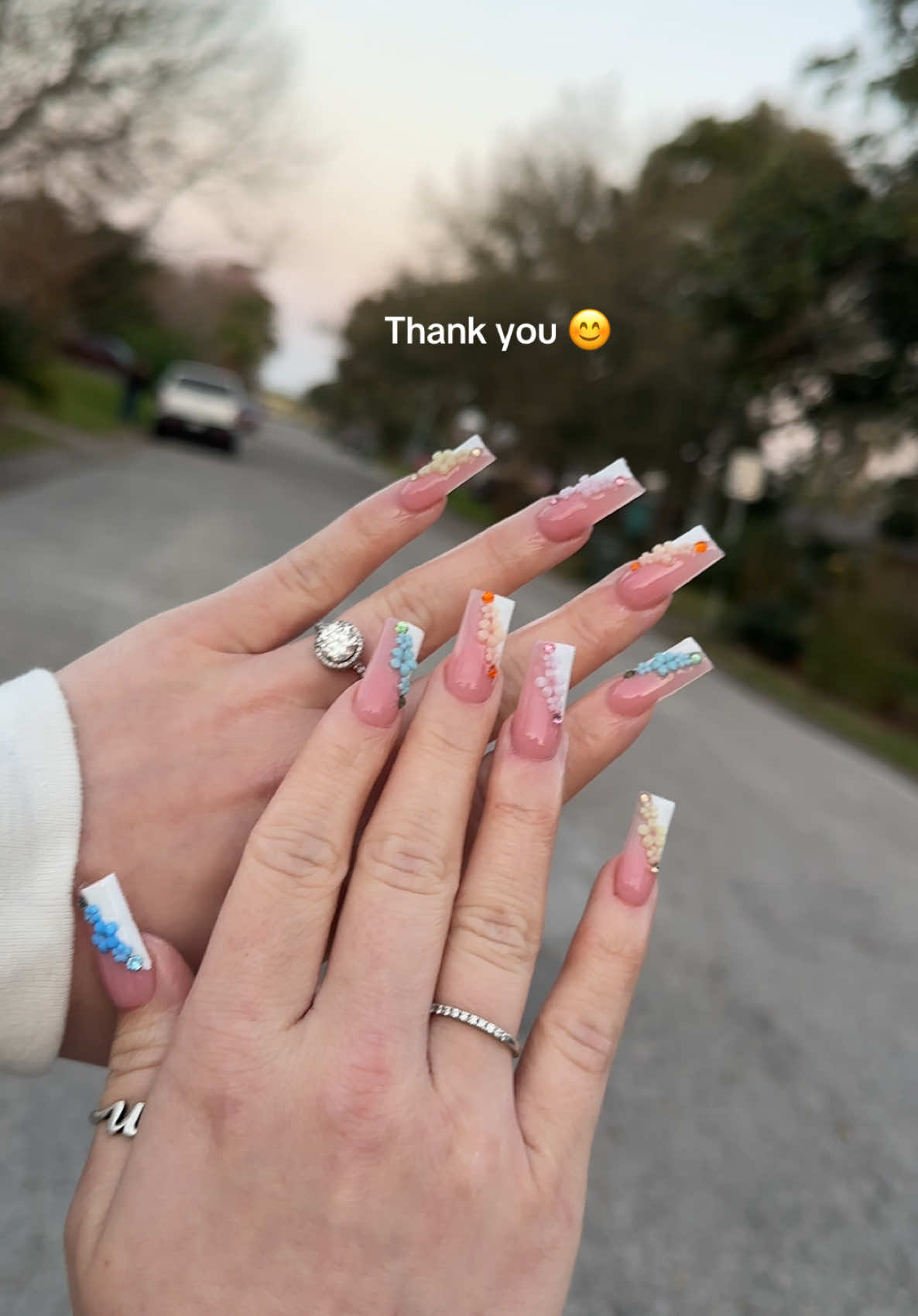 A post by @thanailldoll on TikTok caption: Spring nails 💐 #nails #nailsoftiktok #springnails #acrylicnails #fypシ゚viral 