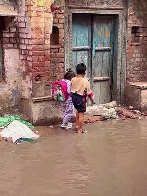 A post by @filmymantra on TikTok caption: Brother Helping Siblings Cross the Waterlogged Road is the Most Beautiful Sight🥹❤️ . . . . #brothersister #brothersisterlove #siblinggoals #trendingviral #bollywood #filmymantra #fyp #foryou #trending 