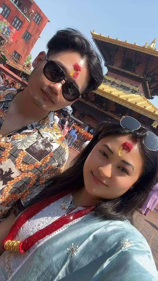 A post by @urmilagrg on TikTok caption: #creatorsearchinsights #oldisgold #oldvideos #urmilagurung #nepal #fyp #nepalisong #newlymarriedcouple #manakamana #temple #gorkha 