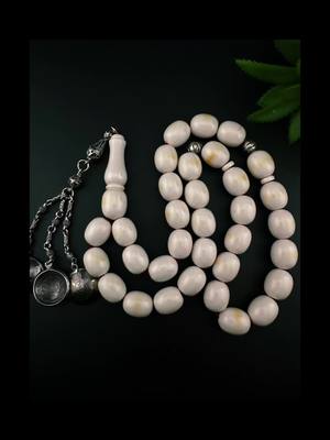 A post by @tasty_bite818 on TikTok caption: AmberSpot👉 eBay .. Vintage Faturan Amber Misbah Sibha #prayerbeads #مسباح #fypシ #luxury #rosary 