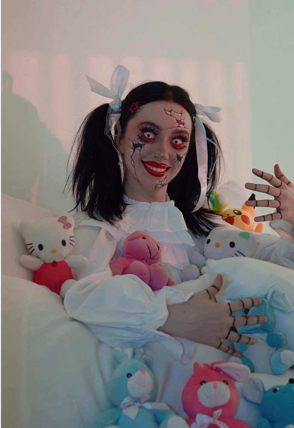 A post by @kkoroba on TikTok caption: creepy broken doll makeup