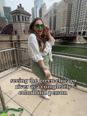 A post by @natashac44 on TikTok caption: How does the green look!? ☘️ #Achromatopsia #Colorblind #Blindness #Blind #Chicago #ChicagoRiver #StPatricksDay #Green #Accessibility #Travel #ForYou #FYP 