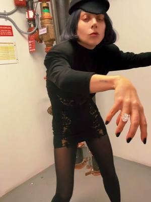 A post by @ladygaga on TikTok caption: I HAD TO DO IT CUZ I SAW YOU DOING IT #MAYHEM in the STAIRWELL🖤🧟‍♀️🧟🧟‍♂️