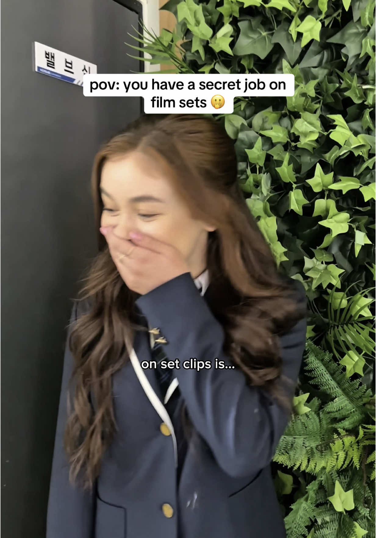 A post by @reaganxo on TikTok caption: hey there🤠 (I do always be hiding) #schoolspirits #onset #filmtok #filmset #filmindustry #milomanheim #peytonlist #xokitty #jennaortega #wednesdayaddams 