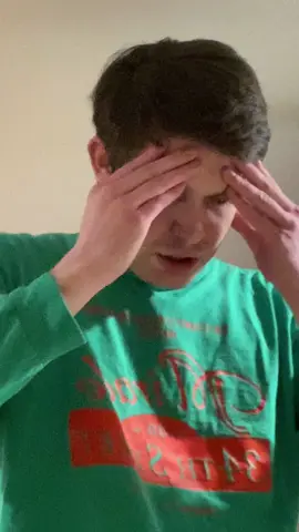 A post by @finnian.w.burns on TikTok caption: You can tell this is a St. Patrick’s Day video because I’m wearing green. Happy Green Day everyone! 💚