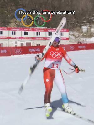 A post by @olympics on TikTok caption: When Beat Feuz kicked and flipped his ski after winning the men's alpine skiing downhill at Beijing 2022. ⛷️ #Olympics #Sports #WinterSports 