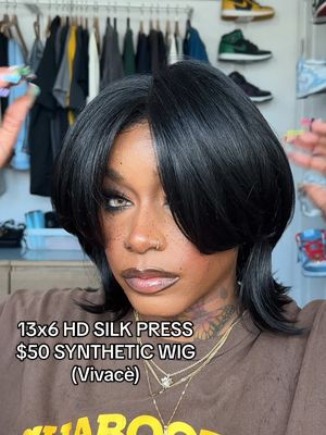 A post by @laurasiaandrea on TikTok caption: I found a $50 synthetic wig that looks like  REAL HUMAN HAIR!? 🥲👀🫶🏾 I’ll take 15 of them pleaseeeee!! This super natural synthetica comes with thinner lace that’s more durable than the popular HD lace and can withstand heat up to 400! This wig collection can be found at your local beauty supply or online @vivaceusa_official. Stay tuned, enjoy ✌🏾🧚🏾‍♀️ Wig Name: Xceptional 13x6 Wig Style: RHEA  Color: #1B   #laurasia #laurasiaandrea #laurasia_yt #laurasiaandreapcos #explore #fyp #blackgirl #5k #viral #hairtok #RedByKiss #vivace #syntheticwig #silkpress #affordablewigs #wig #wiginstall #wigtok #wigtutorial 