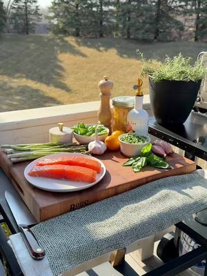 A post by @kristenfaith_eats on TikTok caption: Did I really make pasta on my grill? Yes. Asparagus and Lemon Pasta with Salmon 🫛🐟🍋 #asparaguspasta #lemonpasta #salmon #salmonpasta #easyrecipe #grilling #springrecipe #yum #fyp 