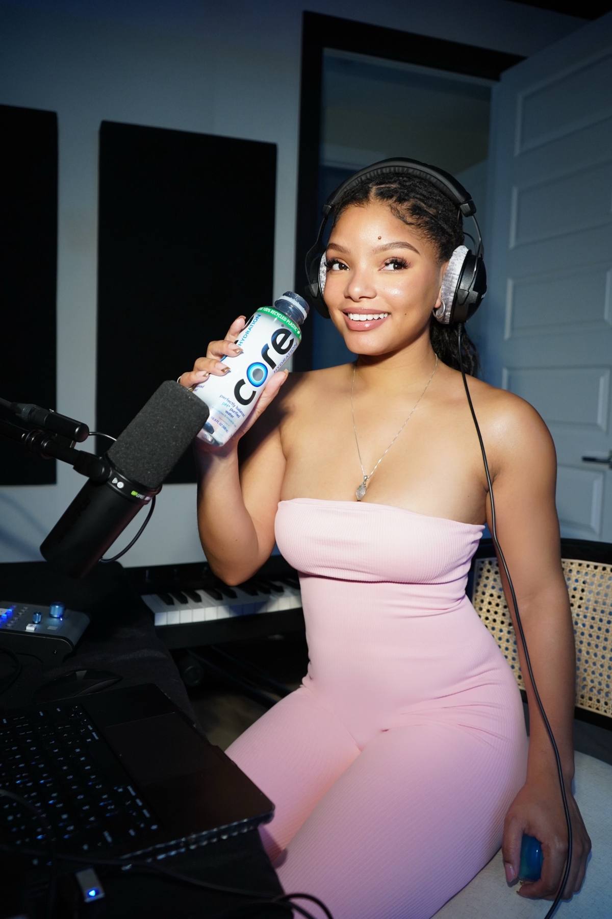 A post by @hallebailey on TikTok caption: #ad Staying hydrated while creating magic in the studio 💕✨grateful to @core for helping me stay on track with my hydration goals for 2025! What's your go-to hydration routine to keep you balanced throughout the day? #startatthecore 