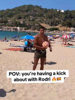 A post by @risingballers on TikTok caption: Imagine playing football on the beach with a Ballon d’Or winner 😂 @Drip Lad  #rodri #ballondor #ibiza #footballtiktok #football #funny #jokes #real #relatable #Soccer #soccertiktok #spain 