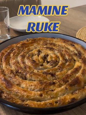 A post by @kuhati.offiziell on TikTok caption: POV: Pratiš Mamine Ruke dok sprema Burek i Sirnicu 🤤❤️ #mama #burek #sirnica #iftar #iftarideas #Ramadan #ramadan2025 #kuhati #kochenmitkima 