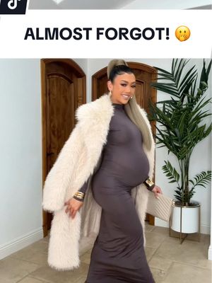 A post by @lianev on TikTok caption: Almost forgot 🫢 #getdressedwithme #fashion #pregnant 