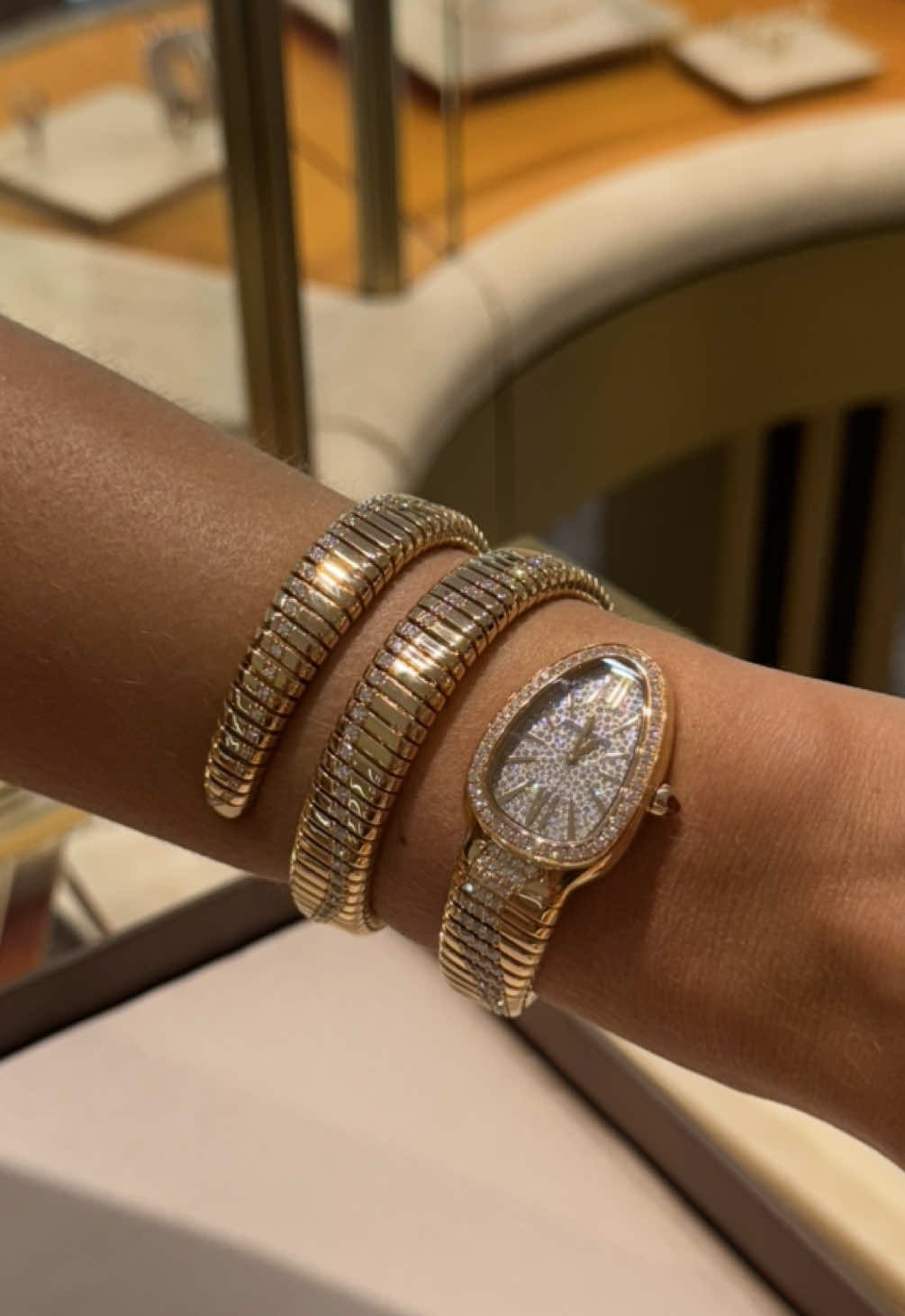 A post by @miamidesigndistrict on TikTok caption: An unmatched feeling. Bulgari’s Serpenti watch is on our wishlist all year round.✨ #MiamiDesignDistrict  