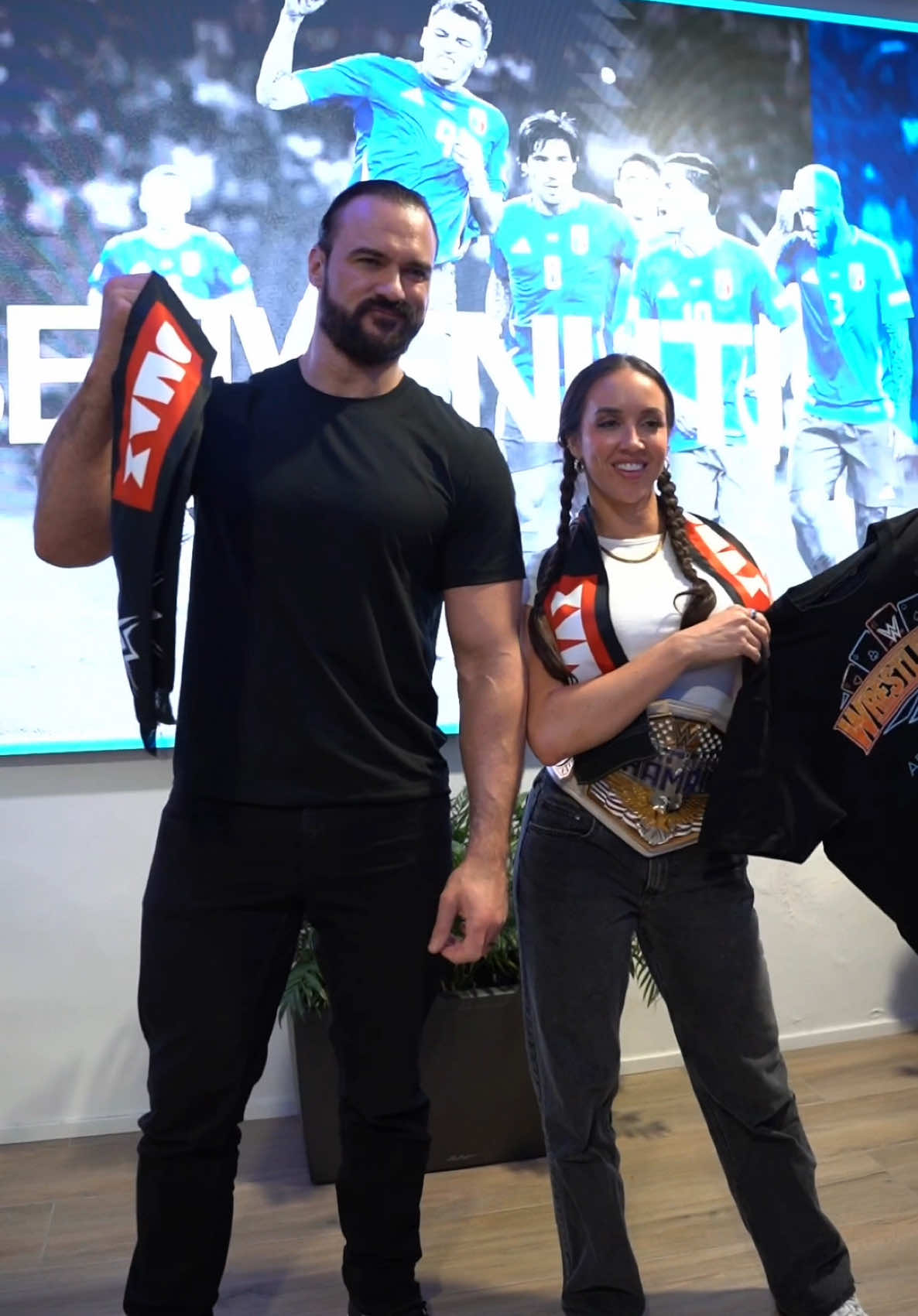 A post by @dmaxitalia on TikTok caption: When Superstars meet Superstars 🤝🇮🇹 #WWE