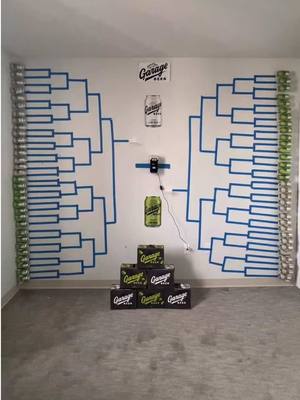 A post by @traviskelce on TikTok caption: How’s your bracket looking? @drinkgaragebeer 