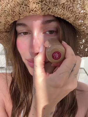 A post by @haileybieber on TikTok caption: very cute and very flushed 🍓@rhode skin 