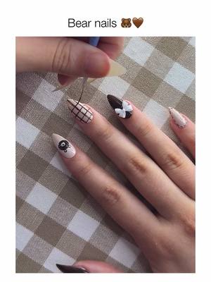 A post by @style on TikTok caption: Rate these nails from 1-10💅 @Mari Nanda #nails 