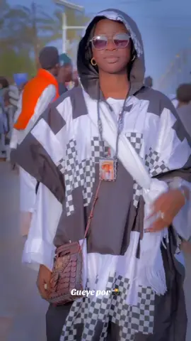 A post by @ndeyendigueulfall on TikTok caption: #yayefallndigueulélémentbayam @BeLeL Hijaab 🧕🏽 @Ndém création 🩵🖤🩵🖤🩵🖤 @AsSalihou Photographe778914880 @Teranga pro❤️🫀 