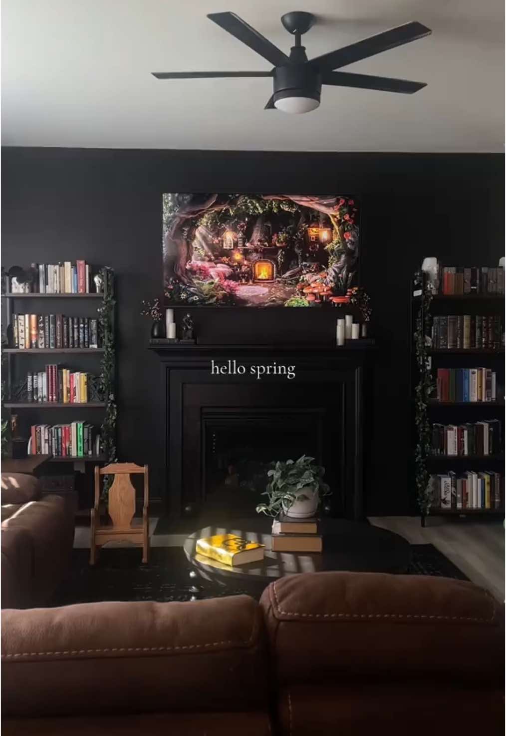A post by @kcallanott on TikTok caption: 🖤 #homeinterior #bookworm #darkacademia #homedecor #cozyathome #darkinterior #gothicdecor #booklover #blackwalls #readersoftiktok #gothichome #darkaesthetic 