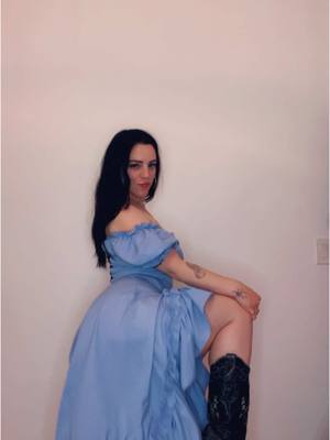 A post by @haleyquinn_la on TikTok caption: this is my favorite dress + boots combo 😩 #fashion 