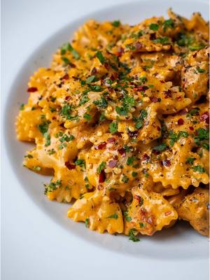 A post by @breadbakebeyond on TikTok caption: Cajun Chicken Pasta Cajun chicken has been a favorite for years, and combining it with pasta takes it to another level. It's flavorful, has a creamy texture, and is super easy to make. I chose farfalle for this dish, but penne, rigatoni, or any other short pasta shape will work great too! #easydinner #pastanight #quickrecipes #weeknightmeal #comfortfood #EasyRecipe #cajunchicken  Easy Cajun Pasta Recipe Quick Chicken Dinner Creamy Cajun Pasta Chicken Recipes Comforting Pasta Dishes