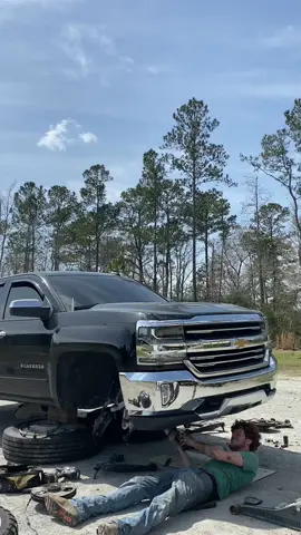 A post by @ohdats_jordan on TikTok caption: Hit us for your lit kit needs 😂 @Nathan Day #squattedtrucks🤢 #squattedtruck #chevy #chevytrucks 