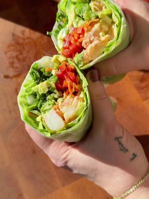A post by @kristenfaith_eats on TikTok caption: Spicy Shrimp Spring Rolls with a tahini dipping sauce 🍤🦐  #springrolls #shrimpspringrolls #healthyrecipes #easyrecipe #peanutsauce #yum #fyp 