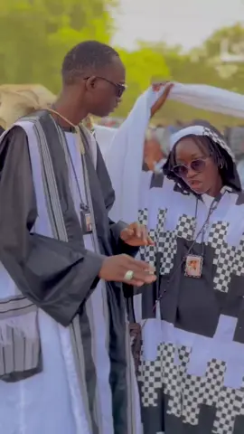 A post by @ndeyendigueulfall on TikTok caption: #yayefallndigueulélémentbayam @BeLeL Hijaab 🧕🏽 @Ndém création 🩵🖤🩵🖤🩵🖤 @AsSalihou Photographe778914880 @Teranga pro❤️🫀 