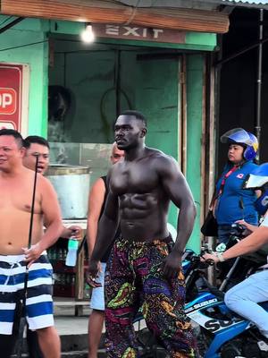 A post by @a_k_da_don on TikTok caption: Bodybuilder in public reactions 😳#fyp #confidence #xyzcba #melanin #philippines #gymnastics #blackmen #philippines🇵🇭tiktok 