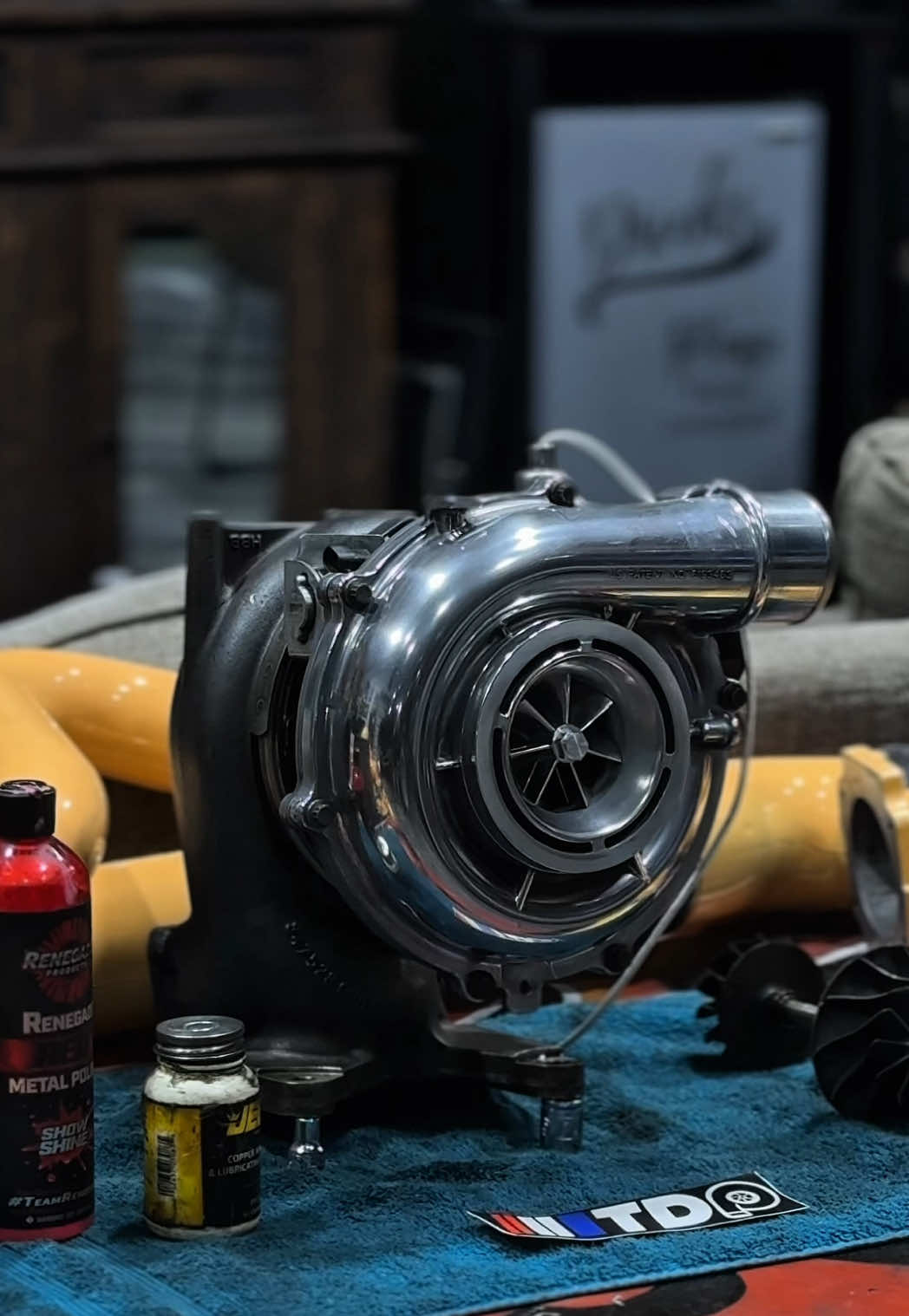 A post by @jesselawless on TikTok caption: Billet compressor wheel, 9 blade swap/rebuild on my lml duramax!🔥 My first turbo rebuild, taught myself something, shits sick. #diesel #performance #turbo #lml #duramax #liftedtrucks #builtnotbought #9blade 