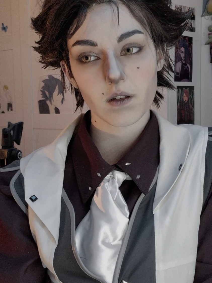 A post by @schneckbert.cosplay on TikTok caption: just some yearning Vik for y'all 🫶🏻🫶🏻 #viktor #viktorarcane #viktorcosplay #jayvik #arcane #arcanecosplay #leagueoflegends #leagueofledgendscosplay #cosplay #cosnrw 