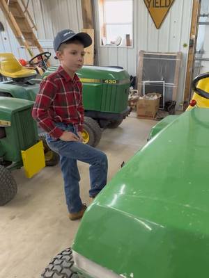 A post by @justajacksonthing on TikTok caption: Jackson is eager for it to dry up around here to get out in the garden and then also get the #johndeere 3020 out to do his first 2 acres he plans to farm this year. A small peek also of the sign @doubleclutchin69 sent to Jackson #justajacksonthing #johndeere #makefarmingfun #futurefarmer #tractor #spring 