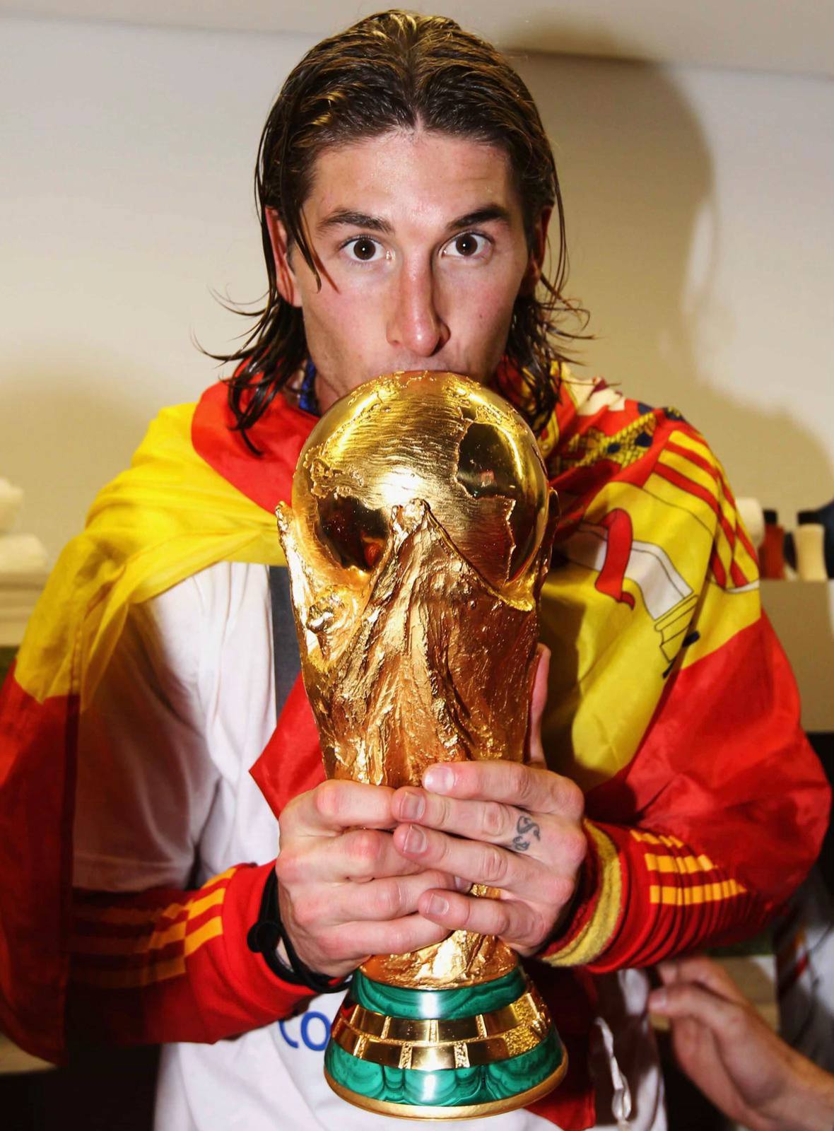 A post by @sergioramos on TikTok caption: Dicen que 20 años no son nada y, si echo la vista atrás, parece ser así. Aunque parece que salté al Helmántico ayer, era 2005 y cumplía un sueño. Otro más. Representar a España, competir por mi país, ponerme la Roja. Empezaba así una de las aventuras más bonitas de mi vida, de esas que se viven en el corazón y no terminan nunca. Tal vez 20 años no sean nada pero, para mí, lo son todo. 1x Mundial 2x Eurocopa 180 partidos, jugador con más internacionalidades con España Gracias ❤️ ¡Vamos, España! 🇪🇸 #OTD