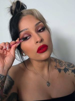 A post by @lora.arellano on TikTok caption: @meltcosmetics x #baileysarian FATALLY YOURS 2 palette is stil my current obsession 💋💄jiulia lipstick xoxo #makeupartist #makeuptutorial #latinamakeup #alttok #smokedeyeliner #altmakeup #smokyeye #fyp #redlipstickgirl #redlipstick #wingliner #fypage 
