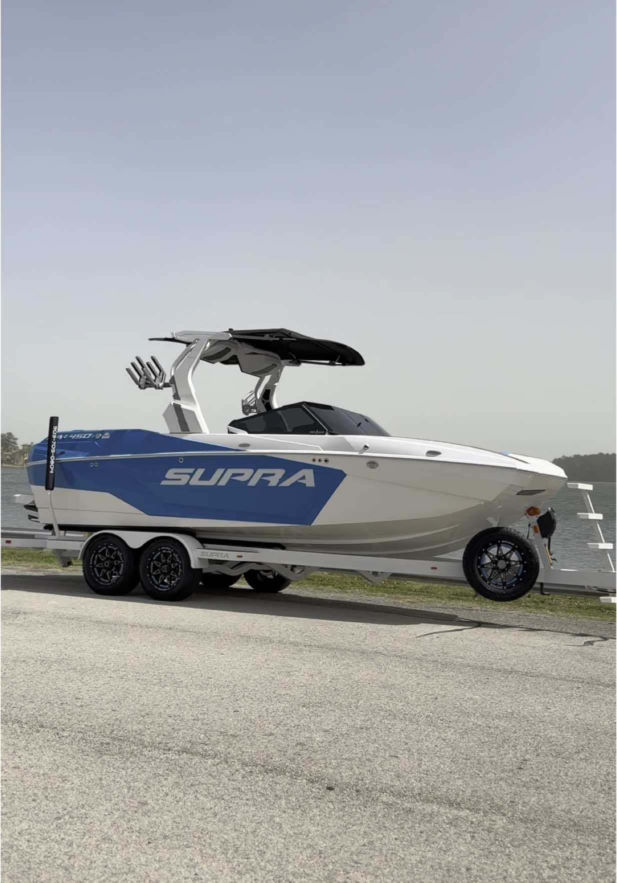A post by @ on TikTok caption: The 2025 Supras are on the ground! #surf #lake #lakeday #wakesurf #fyp #boatsgonewild #2025 #summervibes #supraboats #boat 