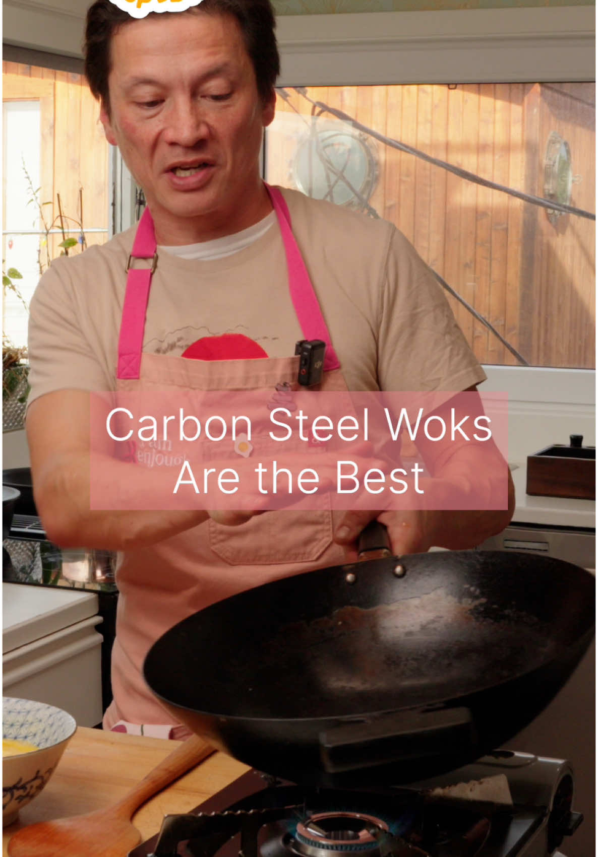 A post by @j.kenji.lopezalt on TikTok caption: When it comes to woks, a 12 1/2 to 14 inch, 16 gauge, carbon steel flat bottom is the way to go.