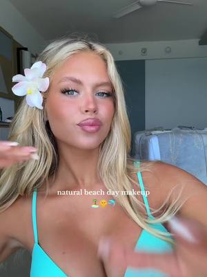 A post by @nats_not_okay on TikTok caption: beach day look feat. a LOT of @rhode skin 🐬🏝️🌞 take me back :,) #fyp tik tok im 21 #makeupinspo #makeuptut #makeupinspo #rhode #saiebeauty #beachmakeup #naturalmakeup #hairinspo #foryou #im21 @Saie @Charlotte Tilbury @Hourglass Cosmetics 