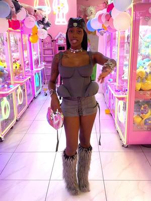 A post by @fashionnprodigy on TikTok caption: This entire studios puffer corset is absolutely to die for! & these vintage Chanel iceland boots? Surprisingly so comfortable and lightweight! Lovee how this look came together. #vintage #ootdinspo #style #nyc #chanel #shopakira #amazon #fashion #maximalism 