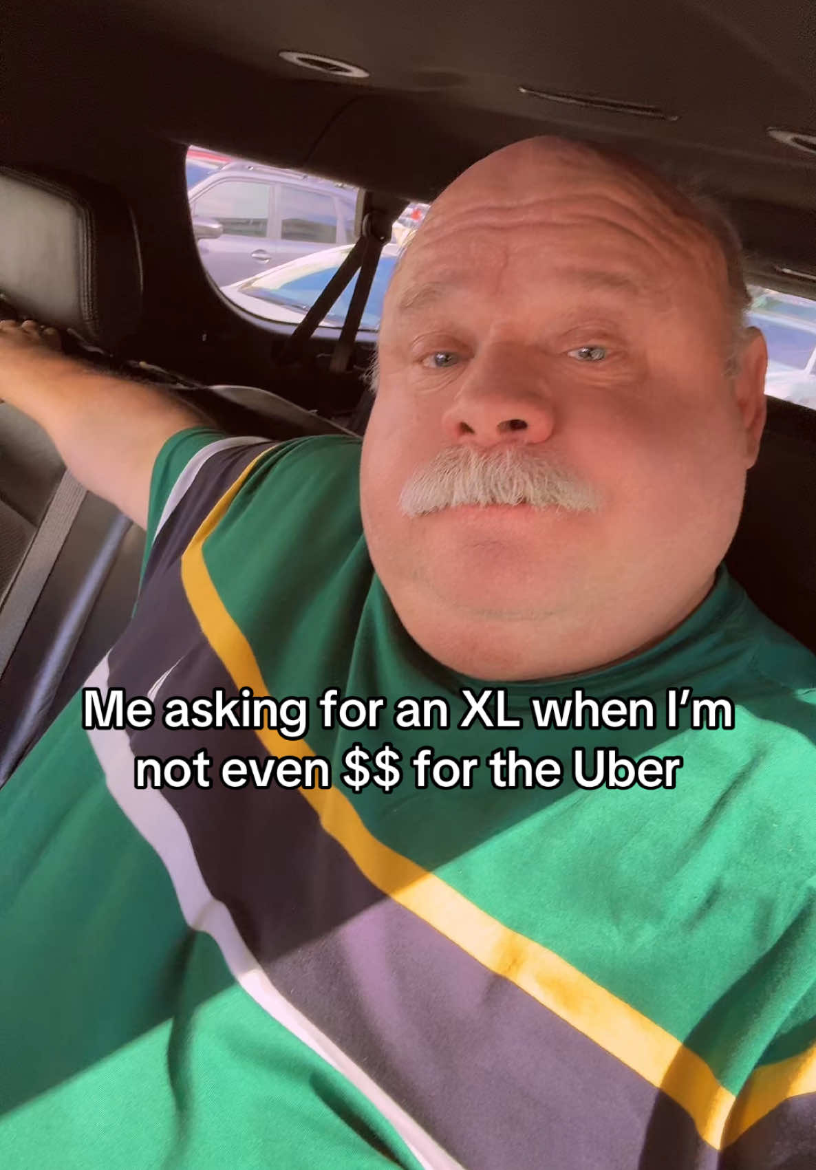 A post by @chamberlin_kevin on TikTok caption: Not all of us can fit into a 2011 Prius. #uber #thewhitelotus #parkerposey #comfy #uberblack #uberxl 