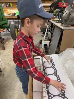 A post by @justajacksonthing on TikTok caption: Jackson is ready to get the @John Deere 4020 back together now that all the parts have come in to be ready for spring tillage #johndeere #justajacksonthing #makefarmingfun #futurefarmer #tractor #spring #plantingseason 