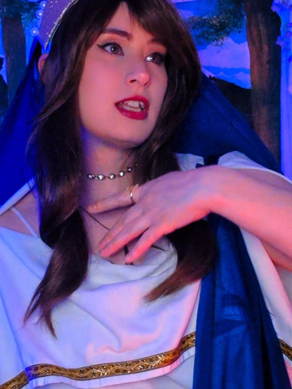 A post by @alycas_cosplay on TikTok caption: Fun fact: the painting behind me was painted as a birthday present for me by a friend of mine like 10 years ago. It's a cherished belonging. #cosplay #alycascos #epicthemusical #penelope #penelopecosplay #theodyssey  #odysseus 