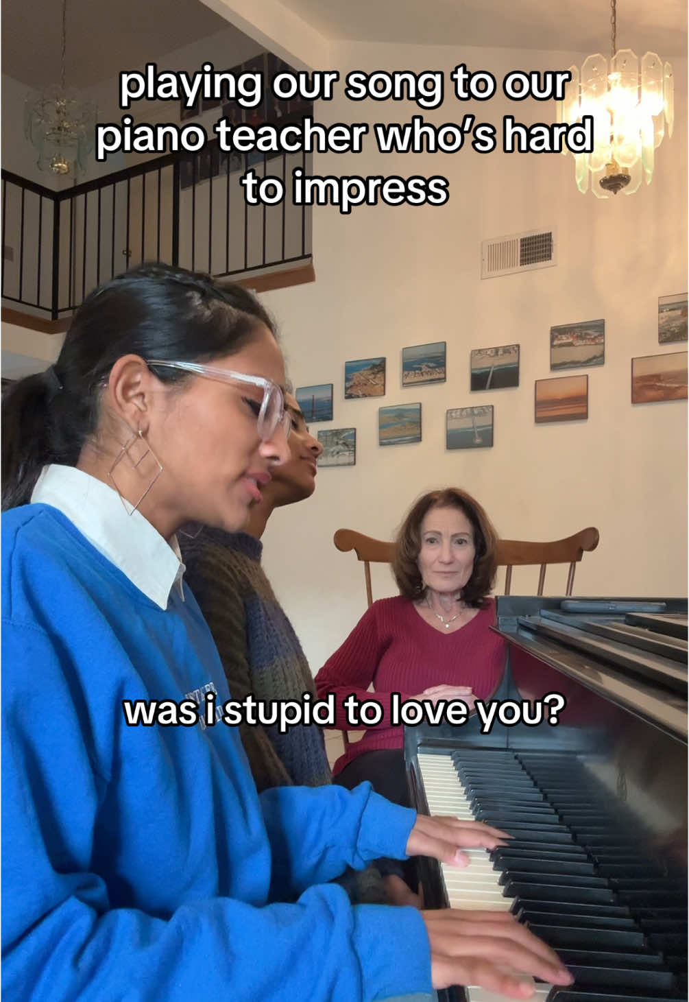 A post by @kiranandnivi on TikTok caption: DOWN TO EARTH OUT everywhere link in bio! This was  nerve-wracking  #original #piano #pianoteacher #reaction #singersongwriter #singing #harmony #12am #lonely #duo #fyp  
