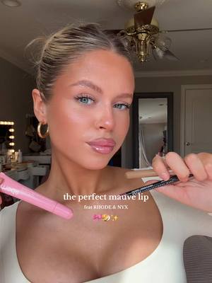 A post by @nats_not_okay on TikTok caption: the perfect mauve lip in 30 seconds🥯🎀✨ also this deluxe release has me in shambles Ariana @rhode skin @NYX Professional Makeup #lipcombo #lipinspo #rhode #makeupinspo #glowymakeup #cleangirl #fyp #fypシ 