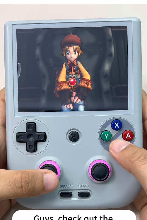 A post by @anbernic_official_usa on TikTok caption: Check out the unique Anbernic RG406V#anbernic #gametiktok #emulation #retrogaming #gaminglife #videogames #Gaming #handheldgaming #retroconsole #fyp #tiktokshopspringglowup #retro 