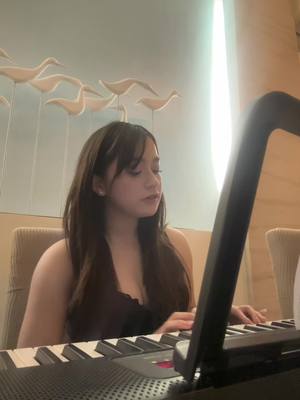 A post by @jillianwxrd on TikTok caption: trying to learn the piano haha