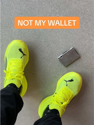 A post by @puma on TikTok caption: oh noooo not my wallet 😏 #PUMA #Running #Wallet 