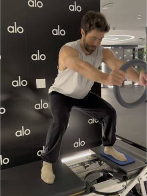 A post by @joeygraziadei on TikTok caption: I heard shaking in a Pilates class is trendy? @Alo Yoga 
